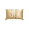 A luxurious satin silk pillow cover in a champagne gold color.