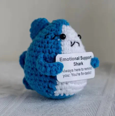 Handmade plush shark toy with blue and white coloring, labeled Emotional Support Shark.