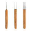 Three wooden crochet hooks with 0.75mm tips shown vertically