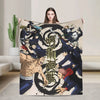 A flannel throw blanket featuring artwork from Jujutsu Kaisen, depicting characters in a dynamic style.