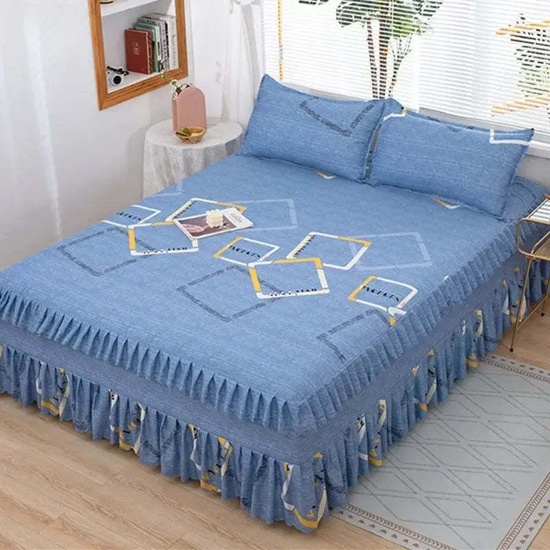 A set of three blue fitted bed sheets with white elastic lace trim displayed on a bed.