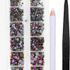 A clear plastic container holds a set of iridescent and dark colored rhinestones with an applicator tool.