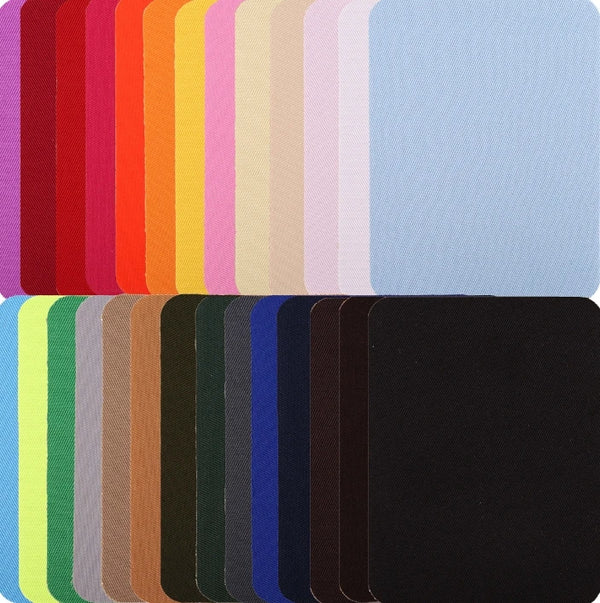 A set of 16 iron-on fabric repair patches in various shades of red, orange, yellow, pink, and blue.