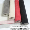 Rolls of suede fabric for car headliners with foam backing in gray, beige, red, and black.