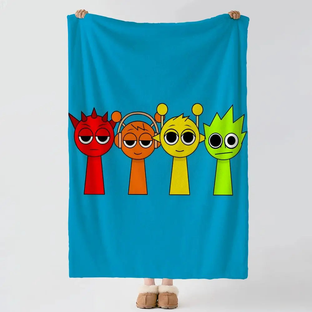 A bright blue flannel blanket featuring cartoon characters in various colors and styles.