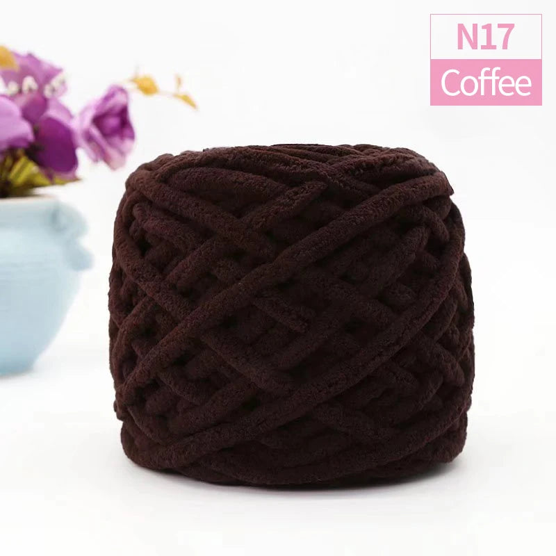 A ball of dark brown chunky velvet knitting yarn labeled N17 Coffee.