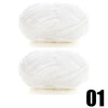 A ball of thick white velvet yarn for knitting and crochet