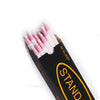 A set of pink and white erasable fabric chalk markers for sewing stored in a black case.