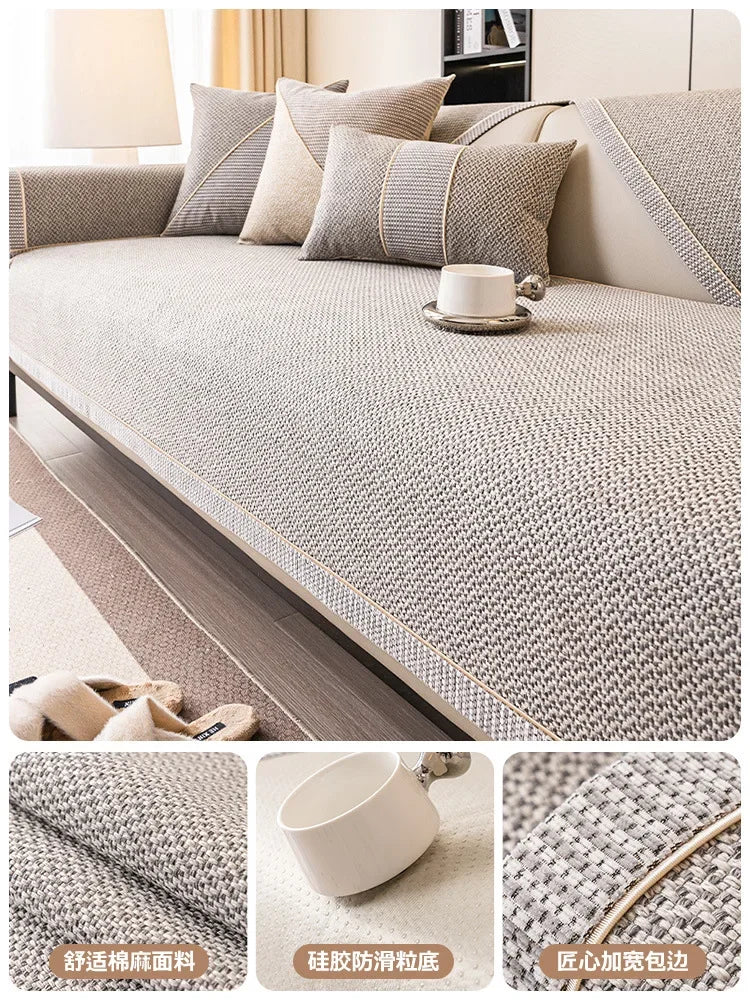 A woven sofa cushion cover in beige and gray tones shown on a sofa with pillows and a cup.