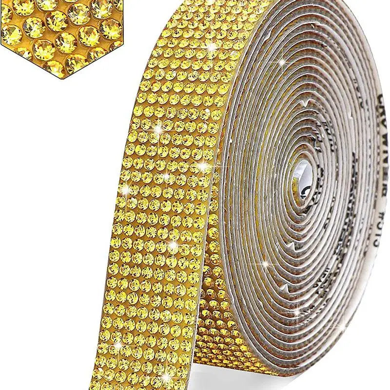 Gold crystal rhinestone sticker ribbon with diamond trim rolled up for crafting and decor