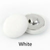 A white round fabric-covered shank button is shown next to its silver metal base.