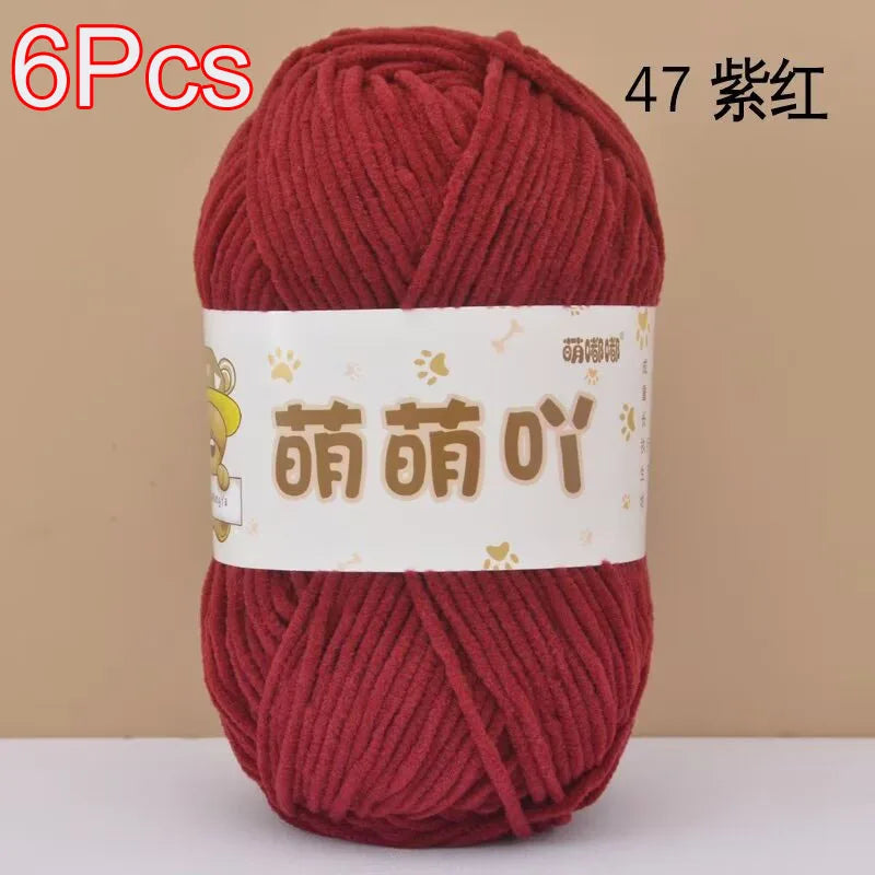 A ball of 6 pieces of red chenille yarn labeled in Chinese characters for crochet and knitting
