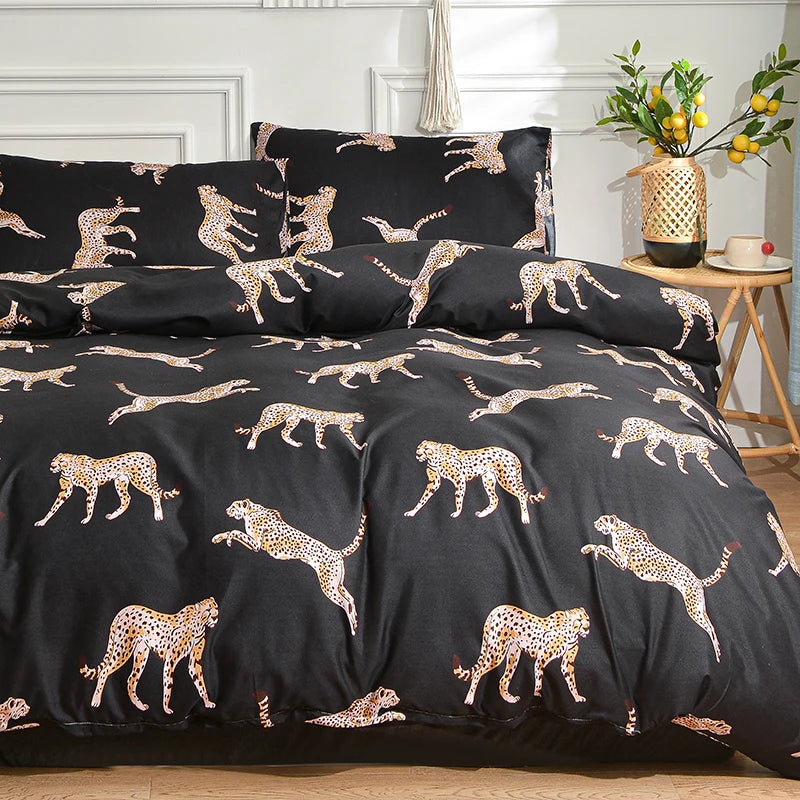 Black duvet cover set featuring a marble print of leopards and cheetahs on a white background.