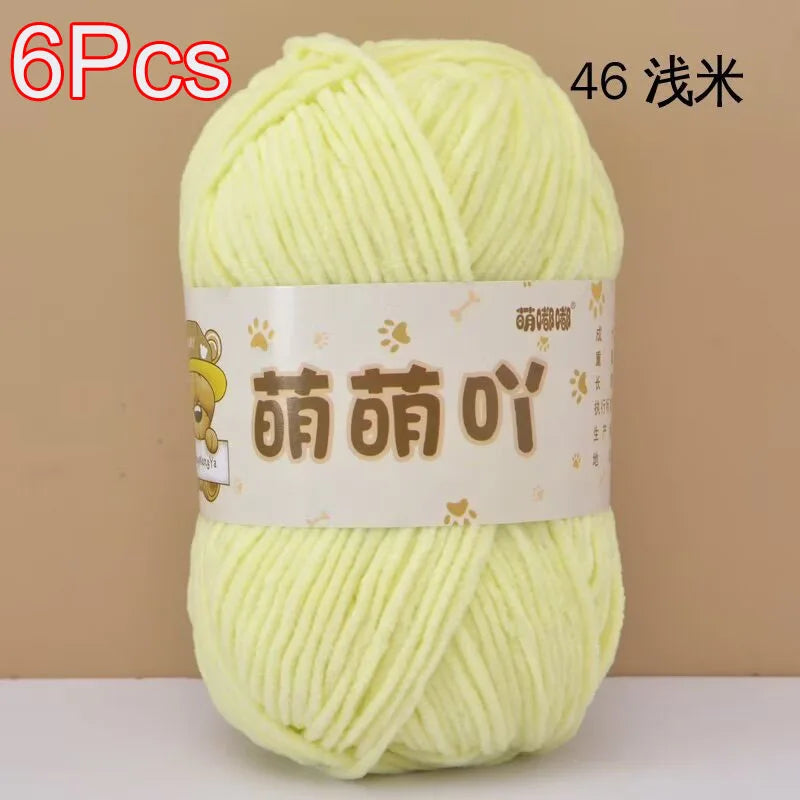 A ball of light yellow chenille yarn labeled as 6 pieces for crochet and knitting.