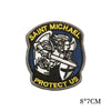 Embroidered patch featuring a stylized sword and shield with the text Saint Michael Protect Us