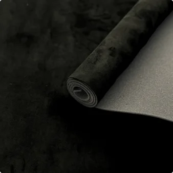 Roll of dark gray suede auto headliner fabric with foam backing
