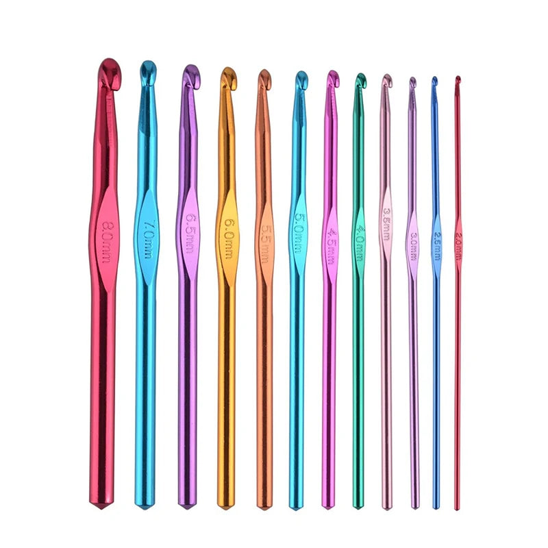 A set of ergonomic aluminum crochet hooks in various sizes and colors, including pink, blue, gold, and green.