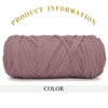 A skein of thick, mauve-colored polyester blended yarn is shown rolled up for crafting.