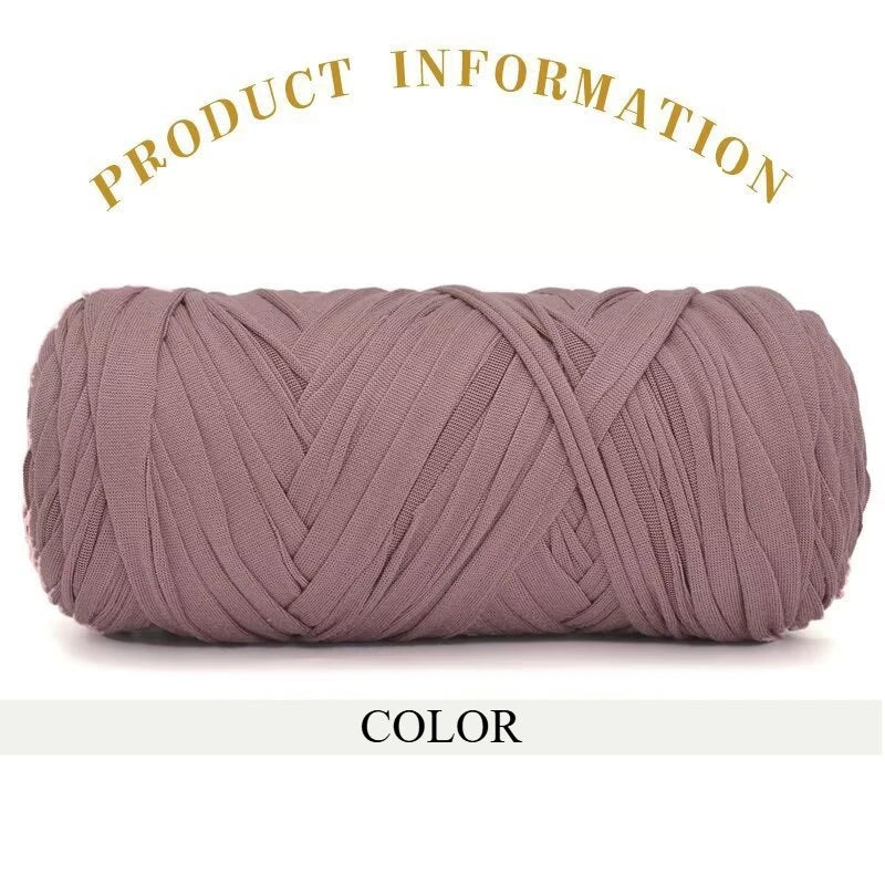 A skein of thick, mauve-colored polyester blended yarn is shown rolled up for crafting.