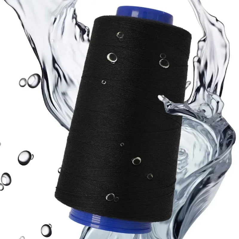 A roll of black heavy-duty waterproof sewing thread is being washed or splashed by clear water.