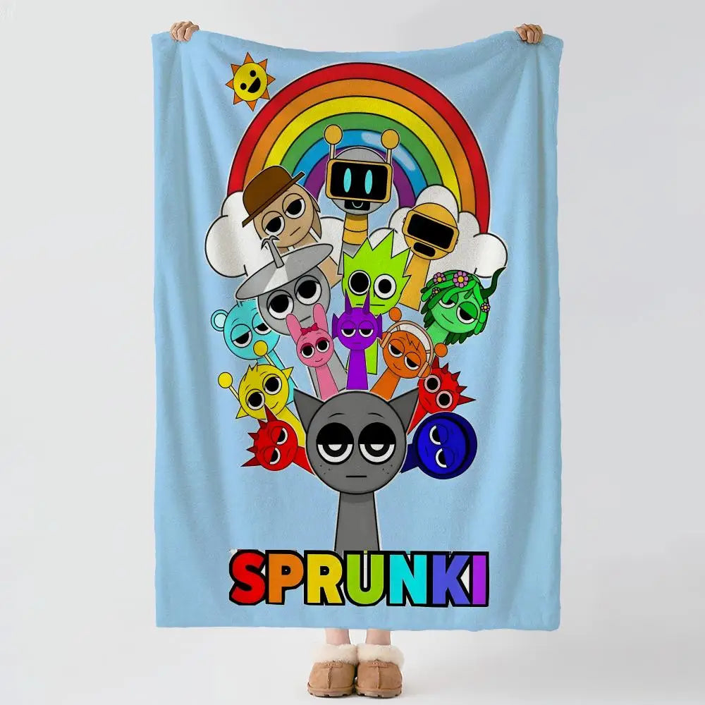 A light blue blanket featuring a colorful rainbow design with cartoon characters and the word SPRUNKI.