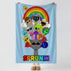 A light blue flannel blanket featuring a colorful rainbow design with cartoon characters and the word SPRUNKI