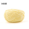A ball of light yellow matte chenille yarn for knitting and crochet