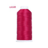 A spool of bright magenta heavy duty nylon sewing thread labeled col.648.