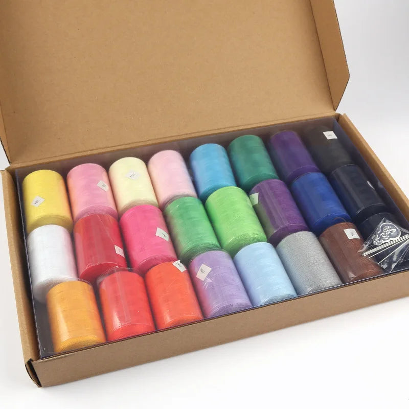 A box filled with 42 colorful polyester thread spools in various shades and colors for sewing and quilting.