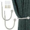 A set of retro metal curtain holdback hooks and corresponding rods shown with individual components.