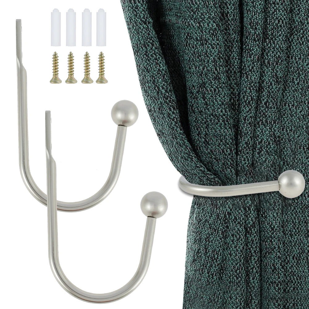 A set of retro metal curtain holdback hooks and corresponding rods shown with individual components.