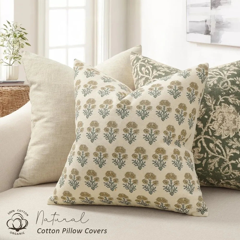 Natural cotton pillow covers featuring a vintage striped floral pattern on a cream background.