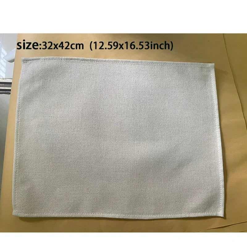 A rectangular white linen blend table placemat displayed flat on a brown surface.