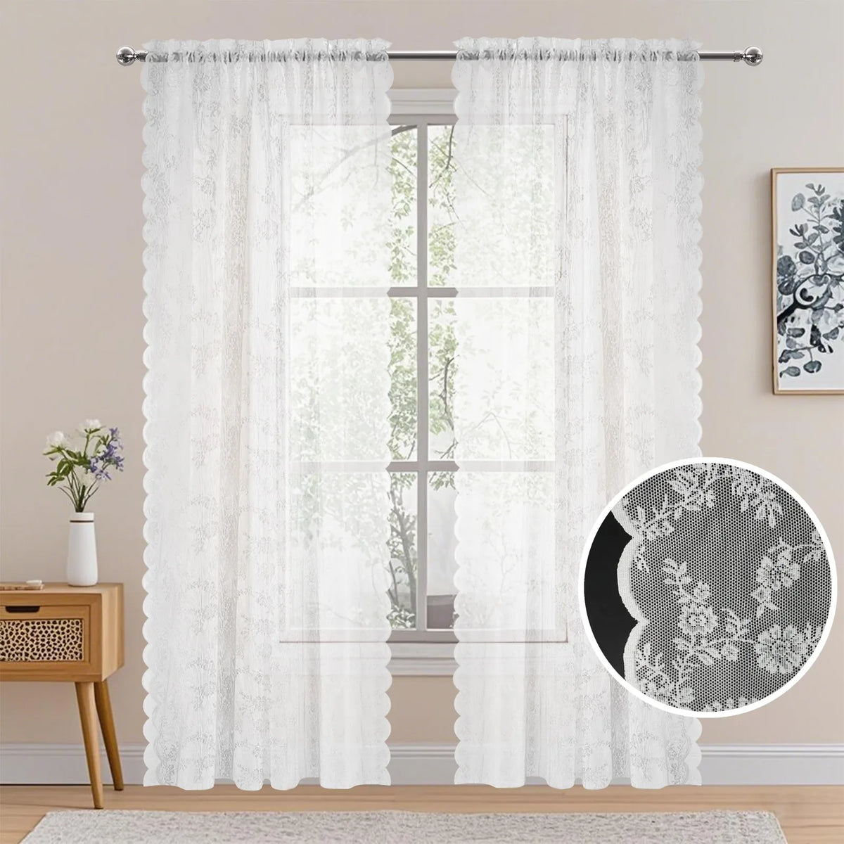 Sheer white vintage floral lace curtains hanging in a window with a vertical mullion.