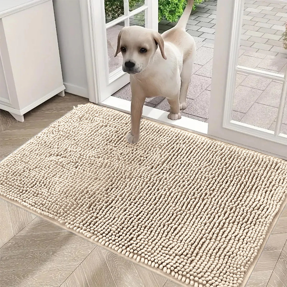 A light beige extra dense chenille pet door mat placed on a wooden floor near a white door frame.