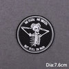 Black embroidered patch featuring a skull design with the text No Flesh No Brain But Still In Pain