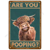 A vintage metal sign featuring a close-up portrait of a brown goat looking directly at the viewer with text asking Are you po