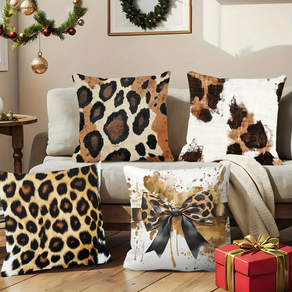 A collection of leopard print decorative pillow covers in various shades and textures displayed on a sofa.