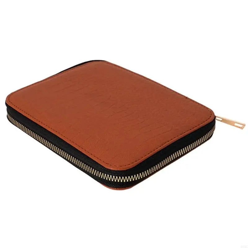 A brown leather-like knitting needle set with a black zipper closure.