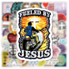 A black and yellow decal featuring a motorcyclist silhouette with a cross, fueled by Jesus.