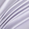 Soft lavender luxury bamboo flat sheets draped in flowing fabric