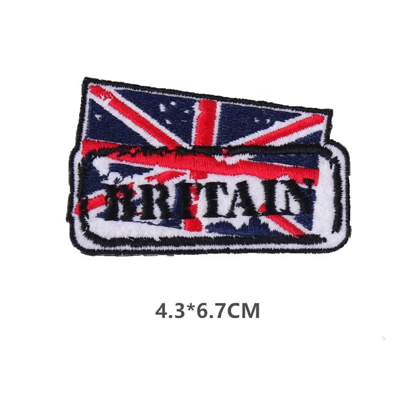 A dark blue embroidered patch featuring the Union Jack design with a red border and white stitching.
