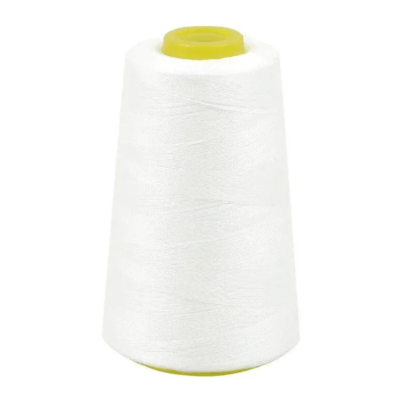 A white spool of premium sewing thread with a yellow core.