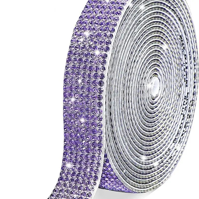 Purple and silver crystal rhinestone sticker ribbon with diamond trim rolled into a circular pattern