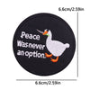 Black embroidered patch featuring a white goose with the text Peace Was never an option.