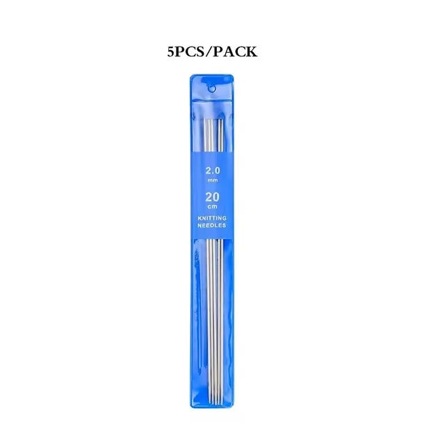 A package of five stainless steel double-pointed knitting needles, 20 cm long.