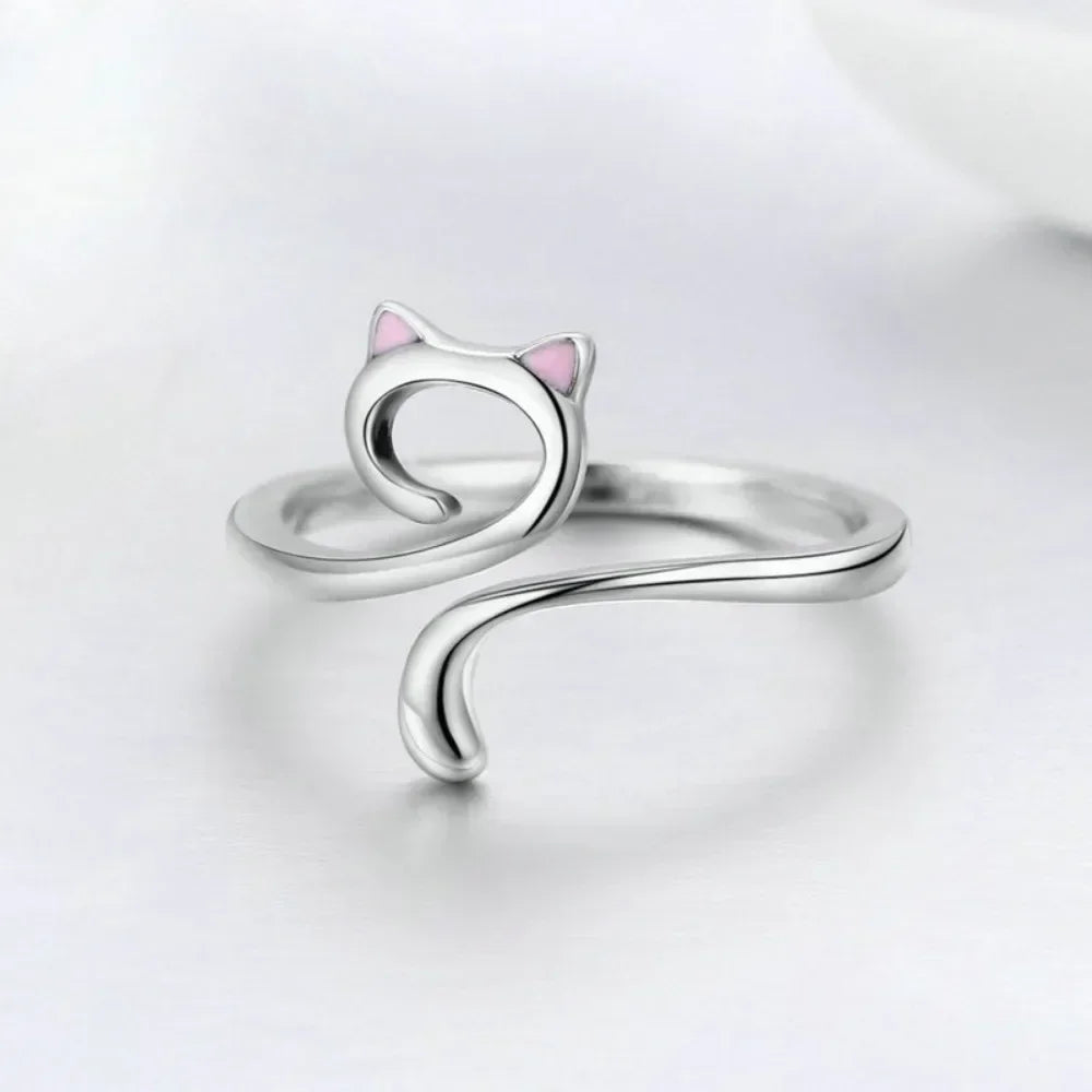 Silver adjustable crochet tension rings for knitting displayed on a white background.