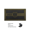 A dark rectangular reflective patch featuring the German eagle emblem on a gold woven background.