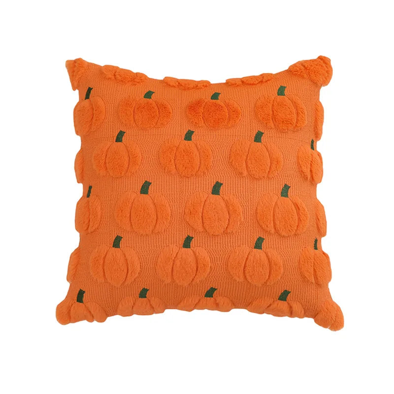 Orange throw pillow covers with a pumpkin pattern