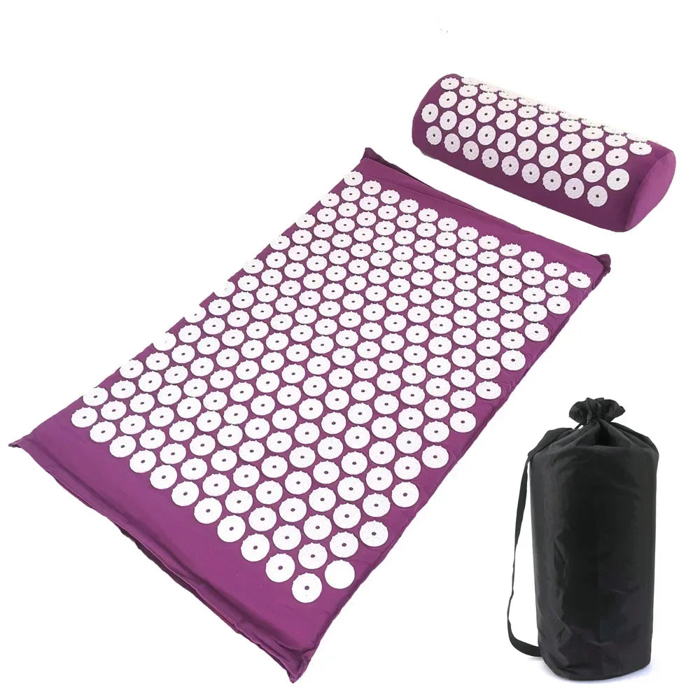 Purple acupressure relief mat and pillow set with white dots